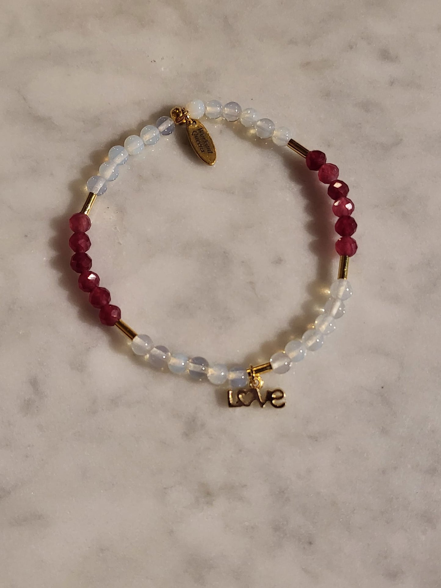 Love’s Radiance (Red Ruby en Opal) met love