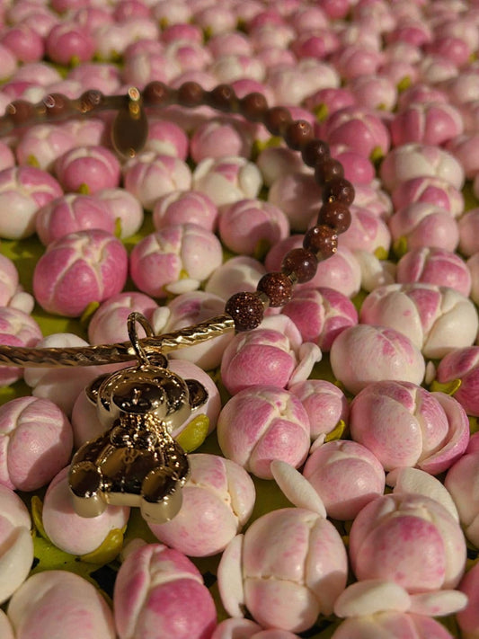 Golden Hug ( goldstone) met beer