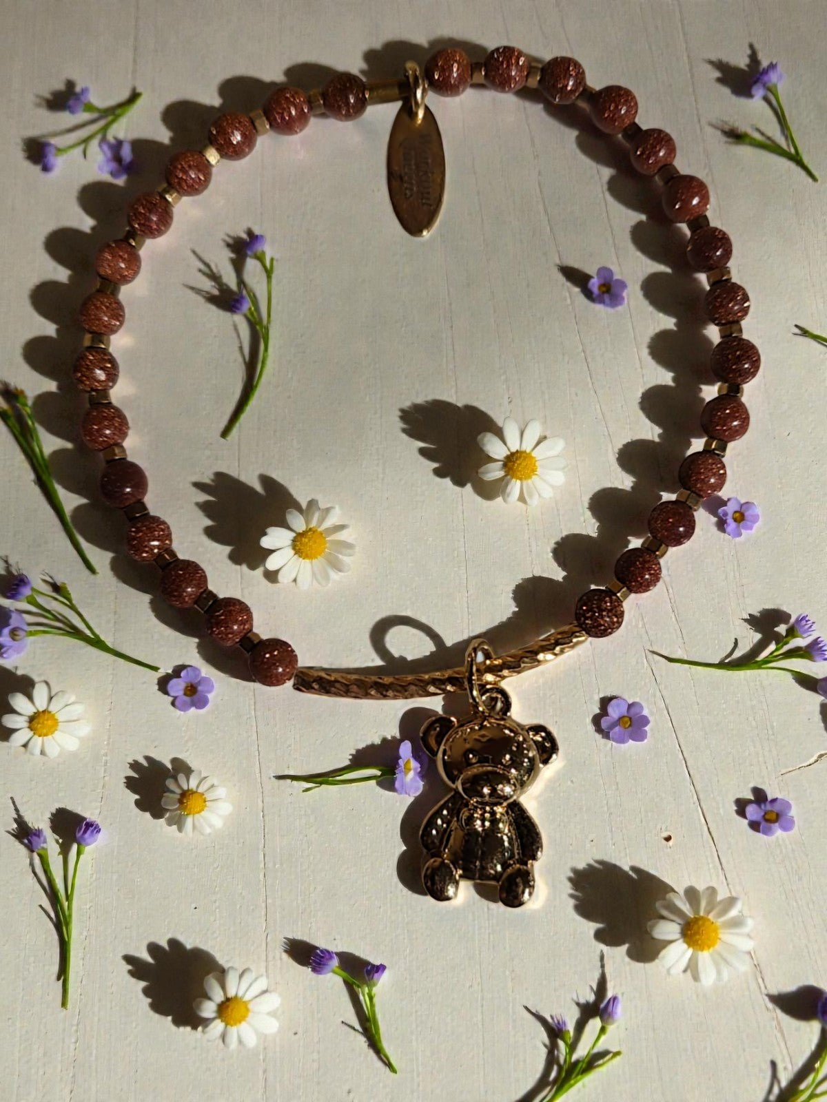 Golden Hug ( goldstone) met beer