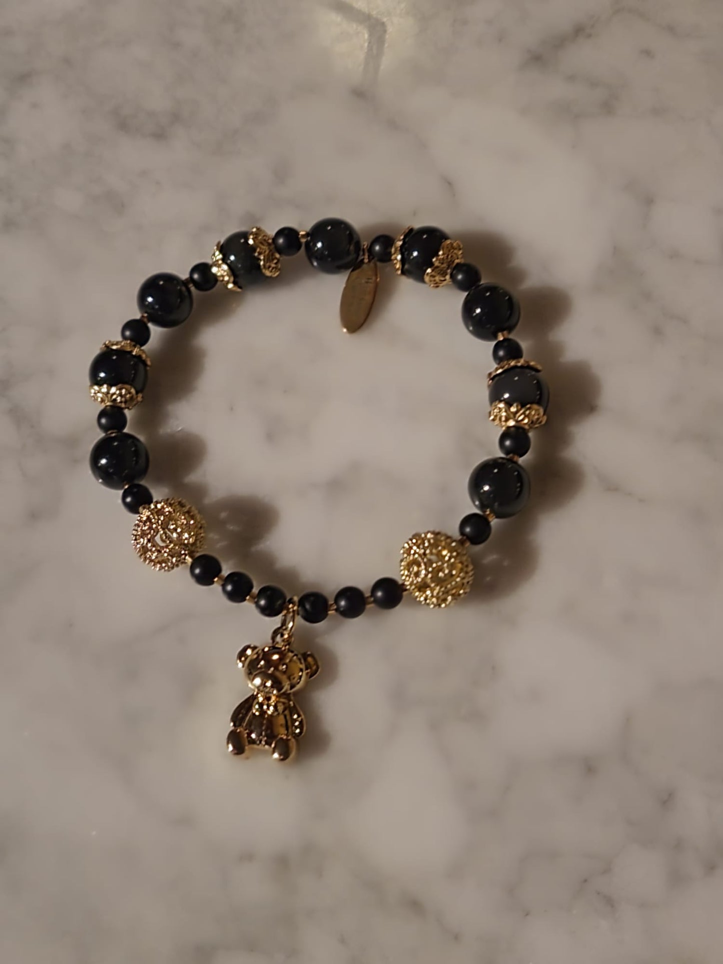 Golden Bear Grace (Matt black agate & obsidiaan ) met beertje